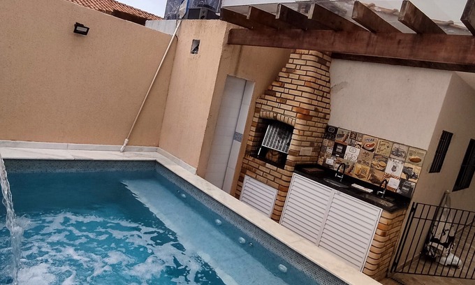 Tupy House | Relaxing Retreat with Heated Pool, Steps from the Beach
