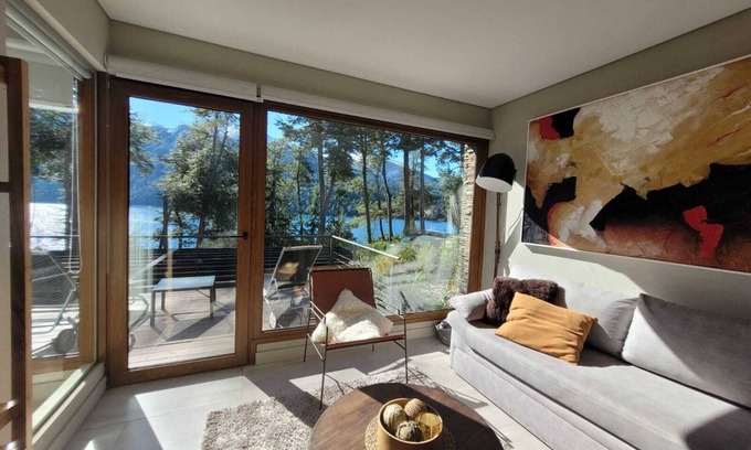 Correntoso Apartment | Tranquil Lakefront Retreat with Pool and Ocean Views