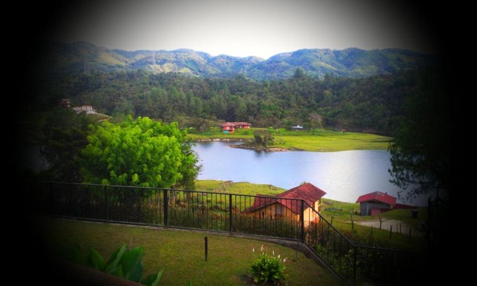 Guatape Villa | Tranquil Lake View Villa with Hot Tub & Town Access