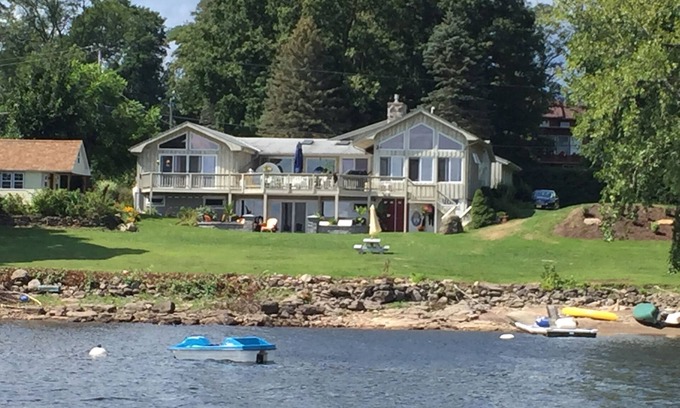 Mayfield House | Idyllic Lake Retreat with Spa and Stunning Waterfront Views