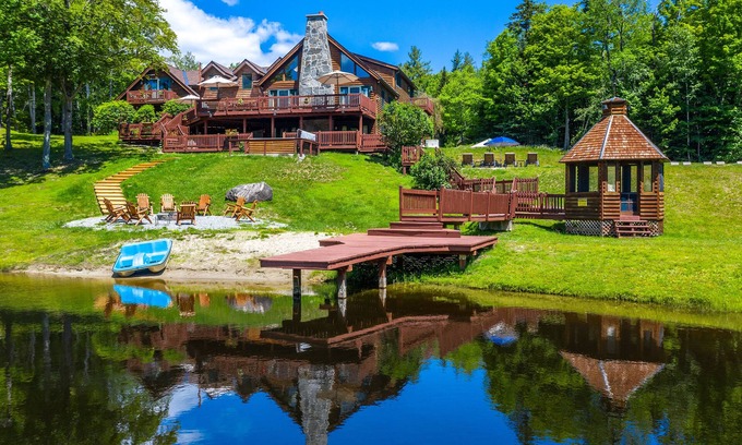 Londonderry House | Idyllic Lakeview Log Cabin with Pool on Spacious Grounds