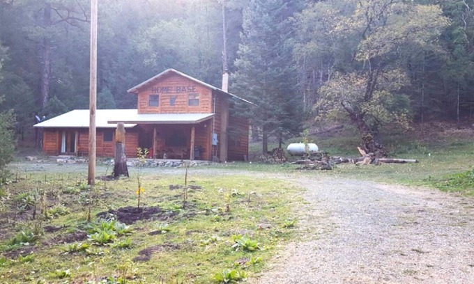 Nogal Cabin | Enchanting Log Cabin by Nogal Canyon Creek: 10/10 Rated Stay