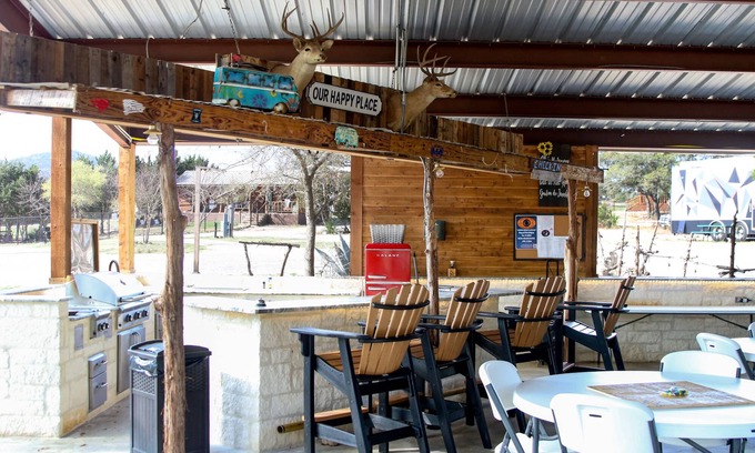 Pipe Creek Cabin | Cozy Log Cabin with Pool Overlooking a Scenic Meadow
