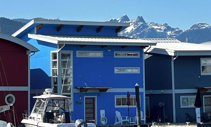 Lower Lonsdale Boat Rental | Romantic Oceanfront Blue Wolf Float Home with Spa & Kitchen