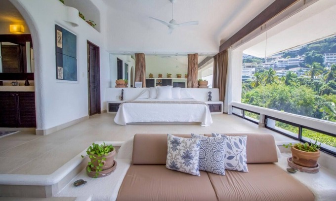 Playa Guitarron House | Coastal Retreat with Breathtaking Bay Views and Pool Access