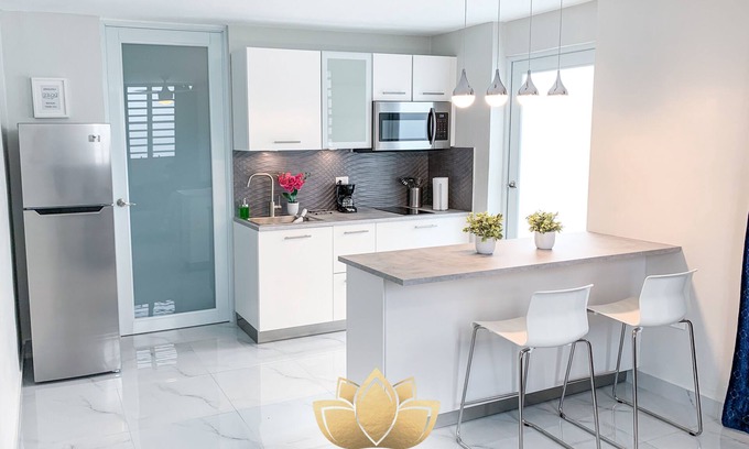 Isla Verde Apartment | Modern Apartment Steps from Airport and Beach - Rated 9.6