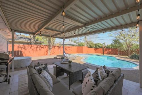 Plano House | Modern Poolside Retreat for Families and Groups