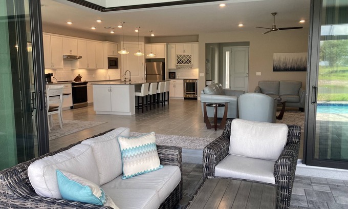 River Hall House | Elegant Country Club Retreat with Pool and Spa Amenities