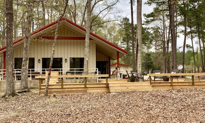Abbeville House | Inviting Lakefront Retreat with Pool and Pet-Friendly Perks