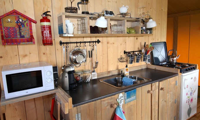Enumatil Cabin | Unique Safari Tent & Circus Wagon with Private Bathroom