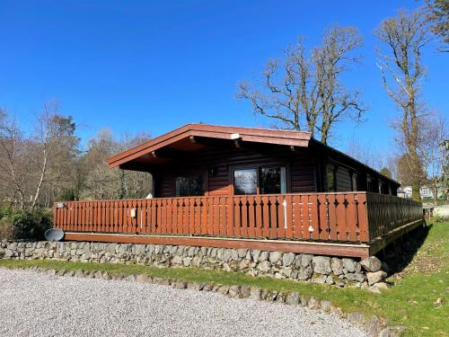 Rockcliffe House | Charming Norwegian Lodge in Kippford with Garden Access
