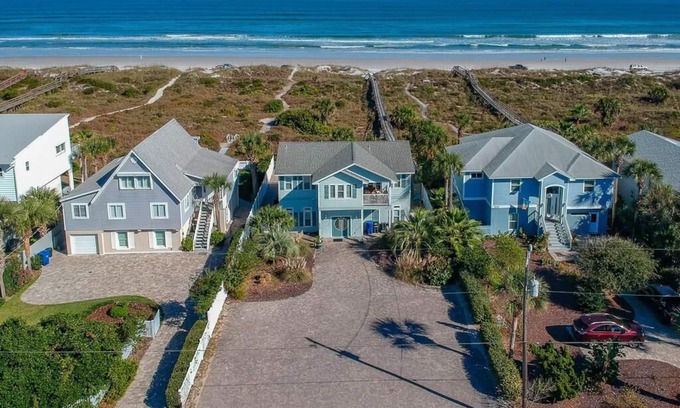 Butler Beach House | Oceanfront Pool Retreat with Private Boardwalk & Spa
