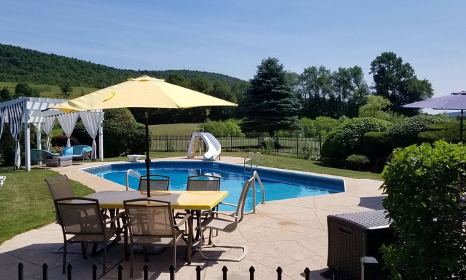 Cooperstown House | Tranquil Rustic Retreat with Pool & Driving Range, 9.8 Rated