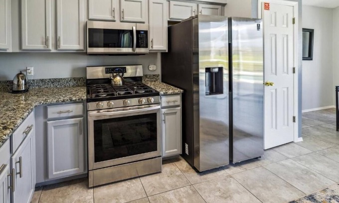 Esprit House | Inviting Pool Home with Golf Course Views & Family Amenities