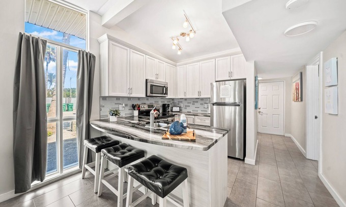 Orlando Beach Condo | Beautiful Riverfront Villa W/Private Beach Access, Fire Pit, & BBQ Grills 🩴🌊