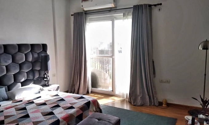 Noida Apartment | Cozy Serviced Apartment with Garden and Pool Views