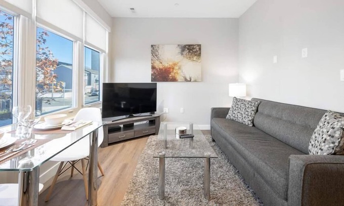 Central-Maverick Square - Paris Street Apartment | Beautiful Studio | Furnished | Rooftop Deck w/ Water Views | GLS