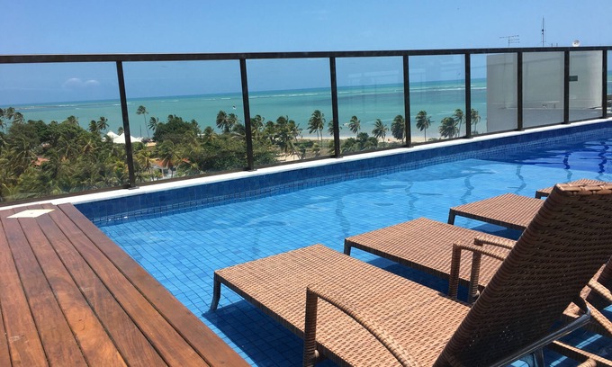 Ponta de Campina Apartment | Inviting Studio with Ocean View in Ponta de Campina