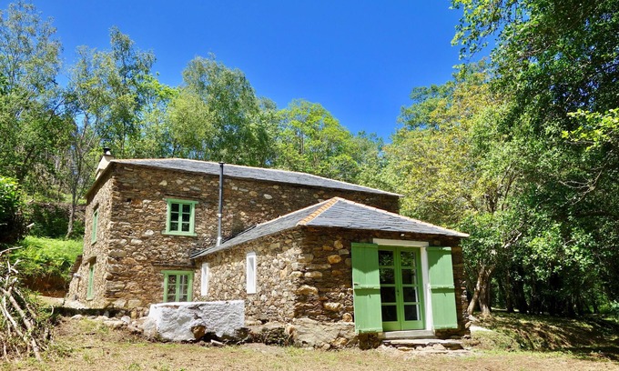 Ortigueira House | Chic Newly Restored Watermill with River Views and Spa