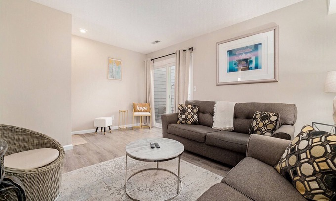 Lawrence House | Inviting Townhome near KU with Spa and Hot Tub Amenities