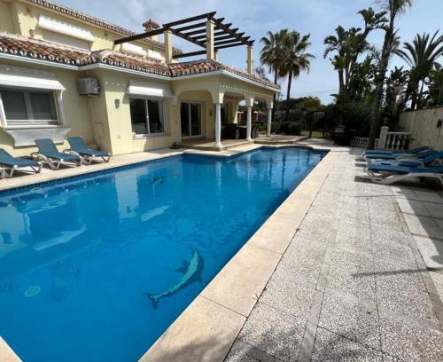 Urbanizacion Marbessa Villa | Idyllic Villa Steps from the Beach with Ocean View
