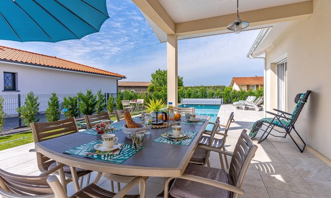 Gastes House | Elegant Villa du Lac: Private Pool & Oceanfront Bliss
