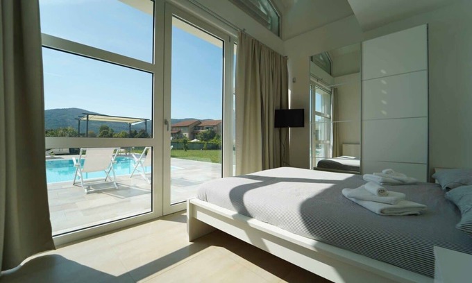 Ameglia Villa | Enchanting Villa Amidst Mediterranean Trees with Pool Access