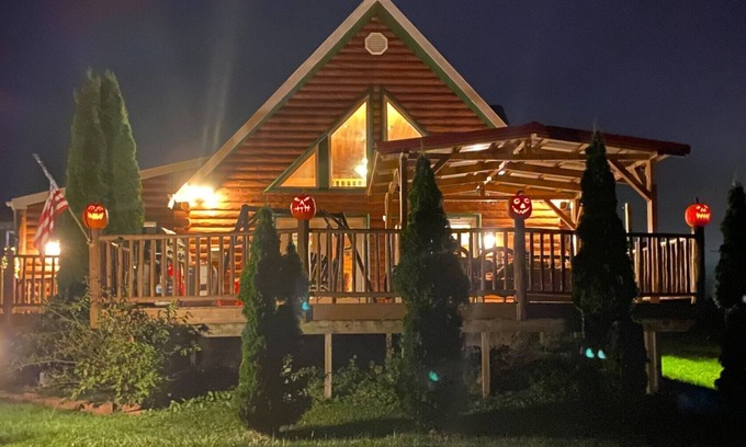 North Lake George Ski Chalet | Idyllic Waterfront Log Chalet at Lake George with Dock