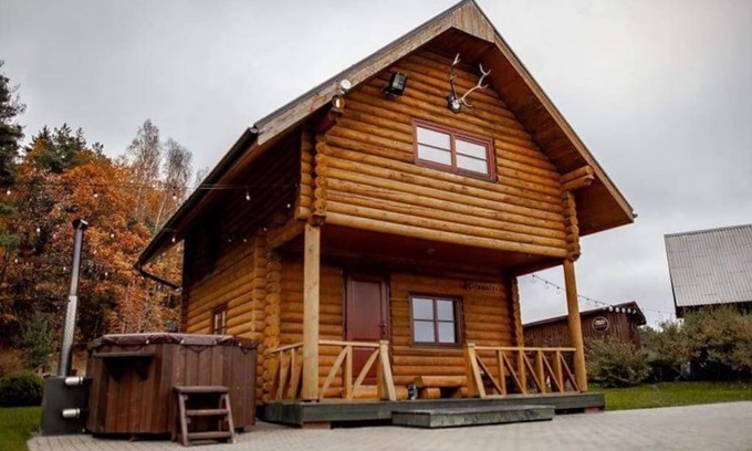 Milzkalne House | Exceptional Log Cabin Retreat with Pet-Friendly Amenities