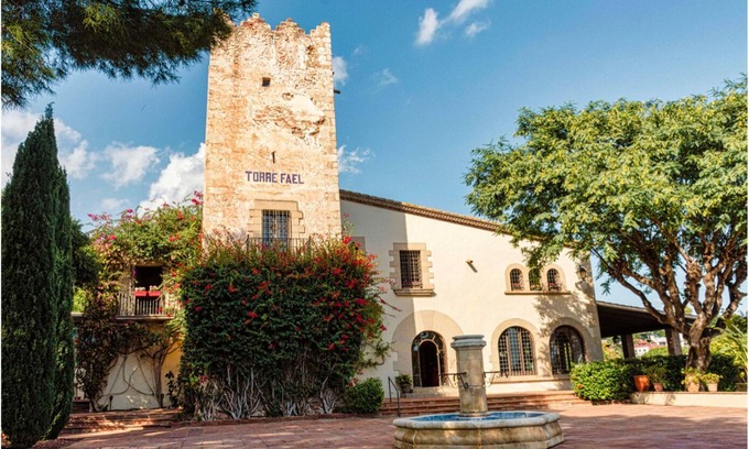 Castelldefels Apartment | Historic Tower Stay with Pool & Family-Friendly Amenities