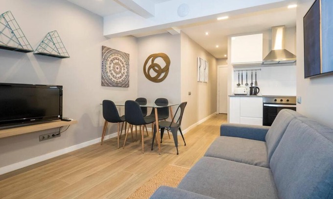 Porta Apartment | Inviting 3-Bedroom Attic in Sant Andreu with Terrace & WiFi