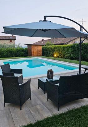 Gargagnago di Valpolicella Bed & Breakfast | Lovely Bed & Breakfast Bure Alto with Oceanfront Pool Access