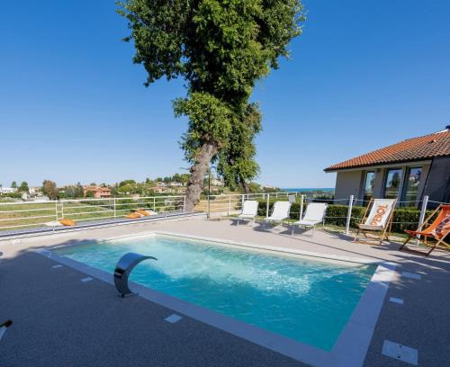 Villaggio Taunus Bed & Breakfast | Cozy bed&breakfast Filomare: Beachfront Retreat with Pets