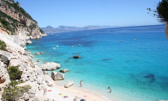 Lotzorai Apartment | Cozy Bedroom with Ocean View Veranda & Spa Amenities