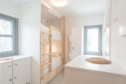 Fira Hostel | Beachfront Bedspot Hostel with Ocean Views & Full Kitchen