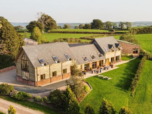 Newtown House | Experience Bliss at Bedw Barn: 4-Star Getaway with Spa