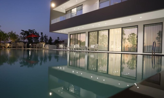 Al-Maghtas Villa | Beit Elhala Villa: Oceanfront Getaway with Pool & Hot Tub