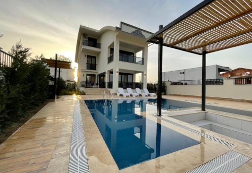 Belek Villa | Belek Emlak: Guest Rated 9/10 with Oceanfront Pool Access