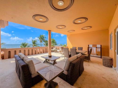 San Pedro Villa | Elegant Belizean Cove Estates Beachfront Villa with Pool