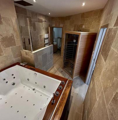 Faubourg Sud Apartment | Relax at Bella Notte Spa with Hot Tub Access & High Ratings