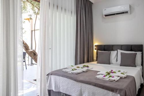 Oludeniz City Center Hotel | Relaxing Belle Vue Ölüdeniz: Oceanfront Retreat with Pool