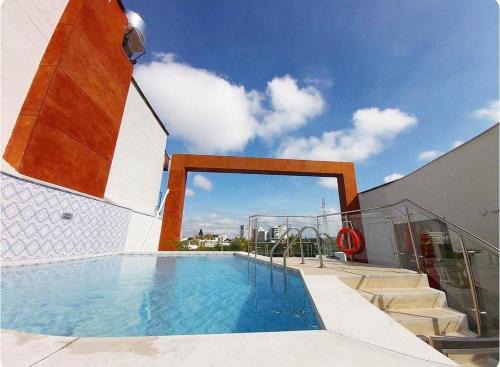 Armenia Apartment | Modern Belmonte Hotel: Pet-Friendly with Hot Tub & Pool