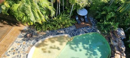 Berry Springs House | Berry Springs Tropical Retreat: Family-Friendly Oceanfront Escape