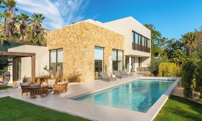 Almancil Villa | Bespoke Quinta do Lago Villa with Heated Pool and Rooftop Jacuzzi