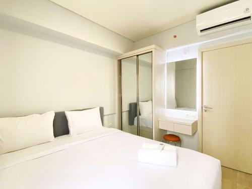 Cikarang Apartment | Cozy 3BR Meikarta Apartment: Your Budget-Friendly Retreat