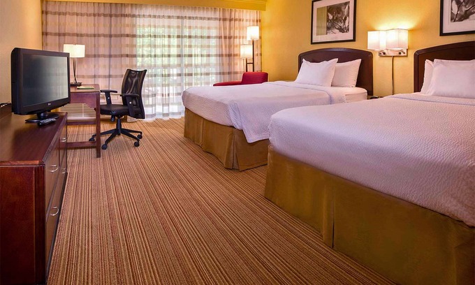 Durham Hotel | Relaxing Retreat: Pool, Free Parking & Pet-Friendly Units