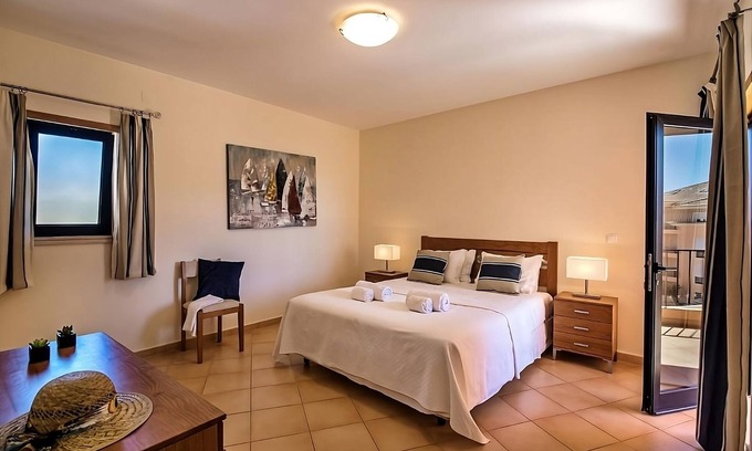 Praia da Luz Hotel | Ideal Getaway with Pools, Kitchen & Oceanfront Views