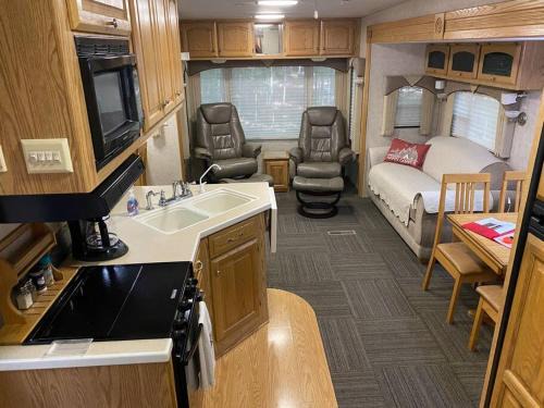 Beulah Apartment | Discover Betsie: Cozy RV Retreat with Hot Tub & Firepit