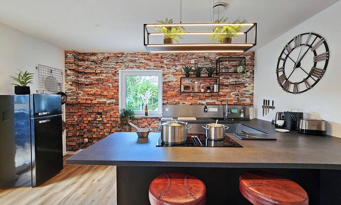 Altusried Apartment | better I industrial apartment I home theater