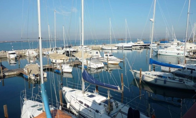 Grado Historic Centre Apartment | Oceanfront Escape: Between Boats and Beach, Apt. 811